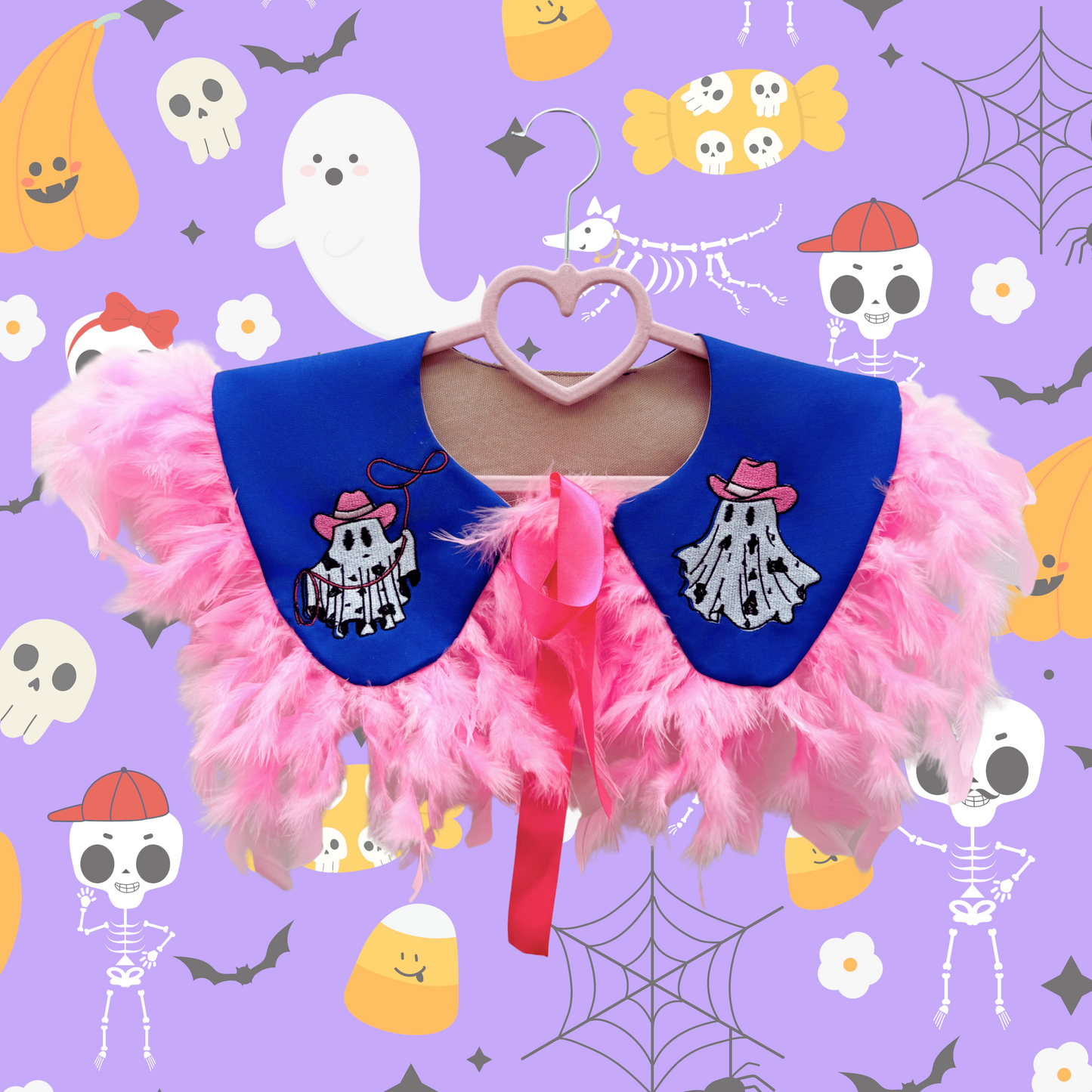 Pink feathered collar with blue accents on a hanger against a Halloween-themed background