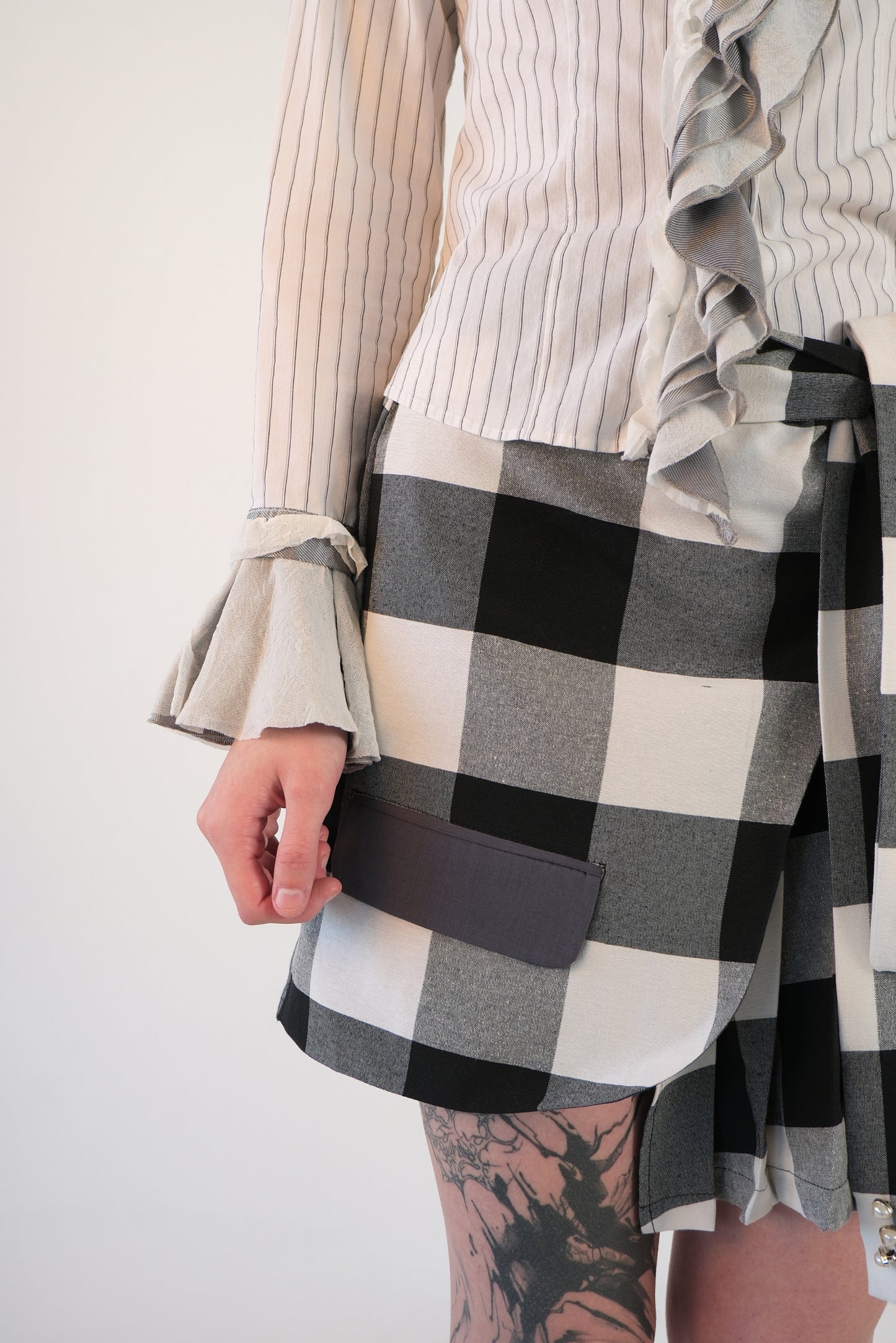 Checkered Asymmetrical Pleated Skirt