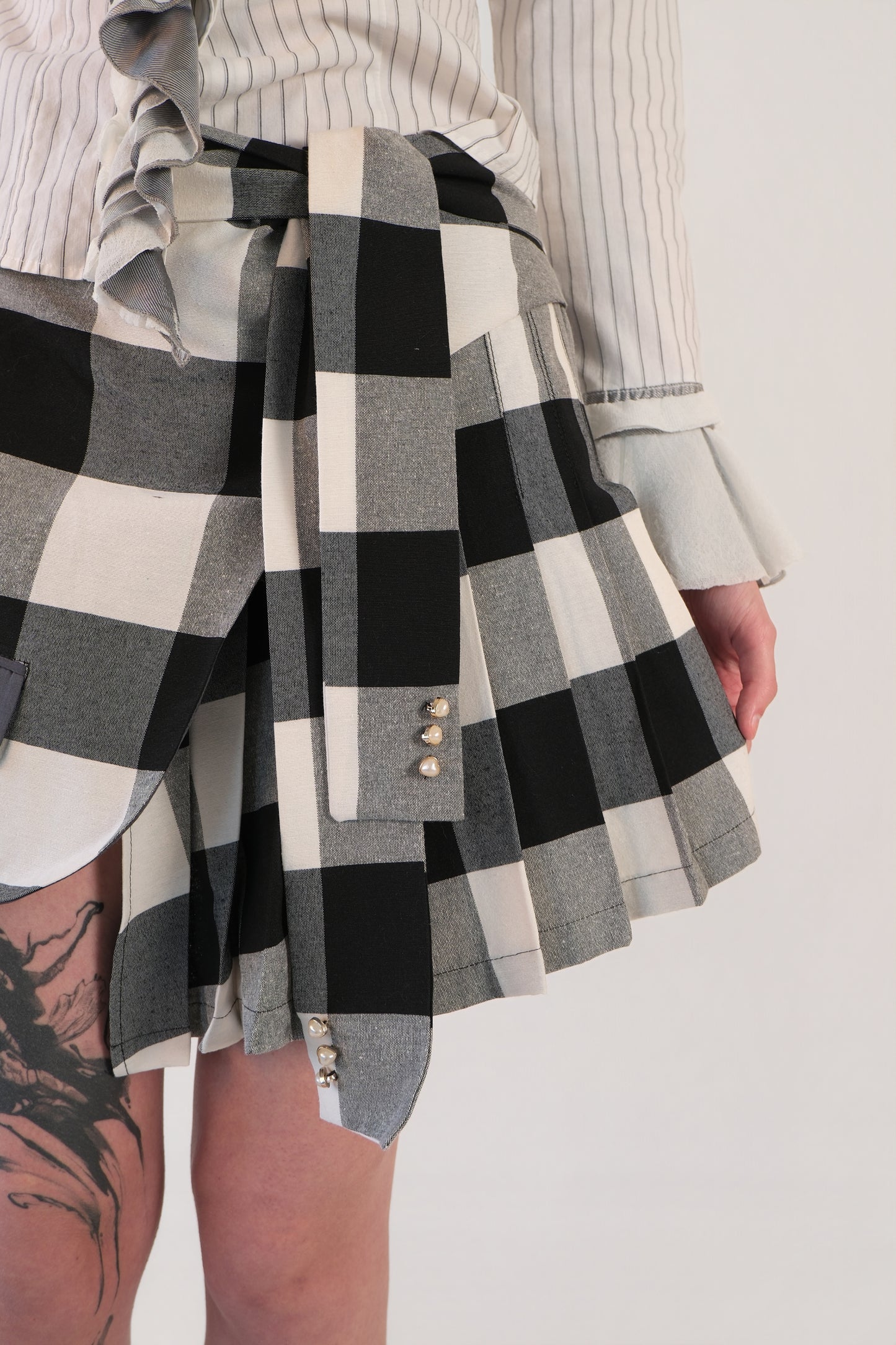 Checkered Asymmetrical Pleated Skirt